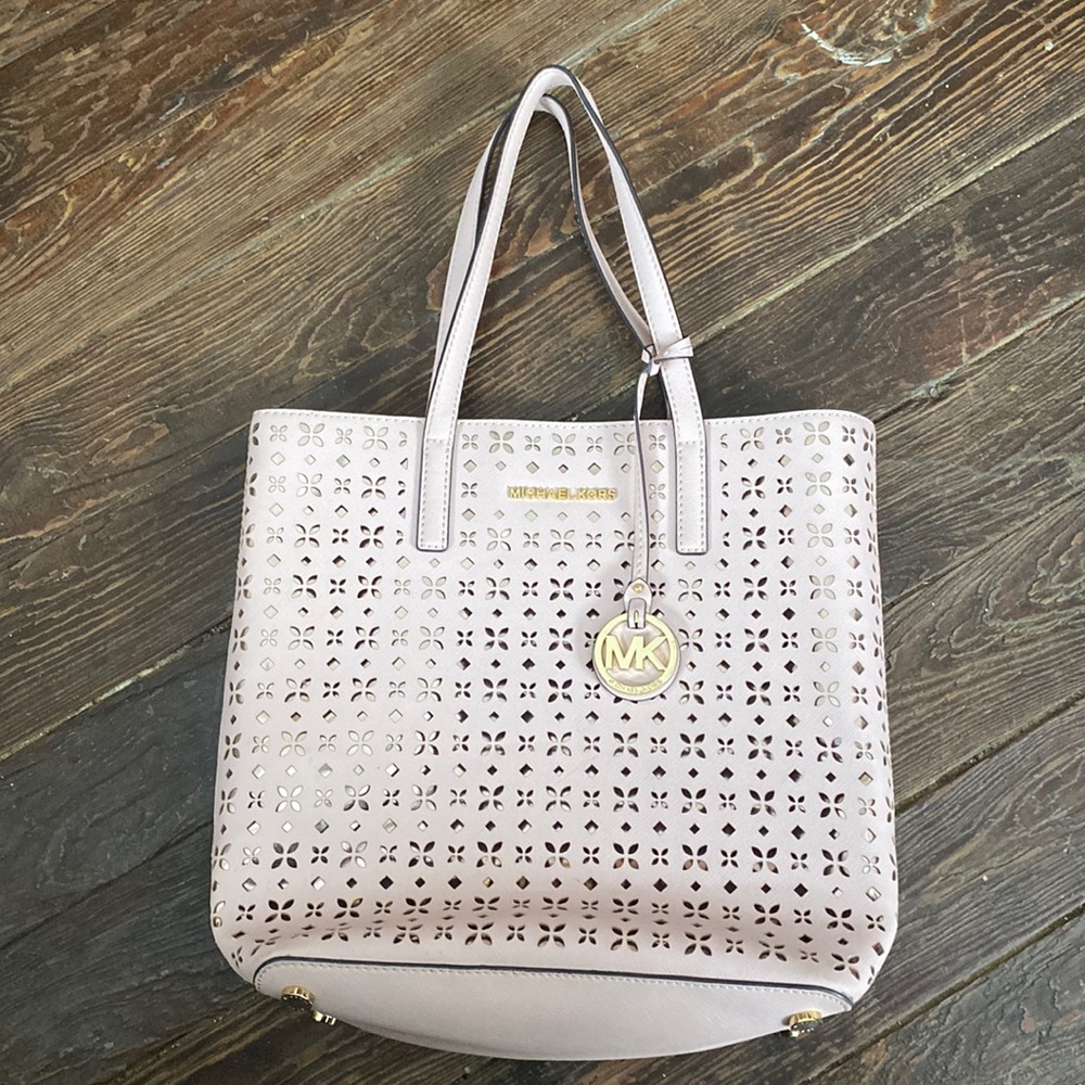 Cute pink Michael Kors purse.